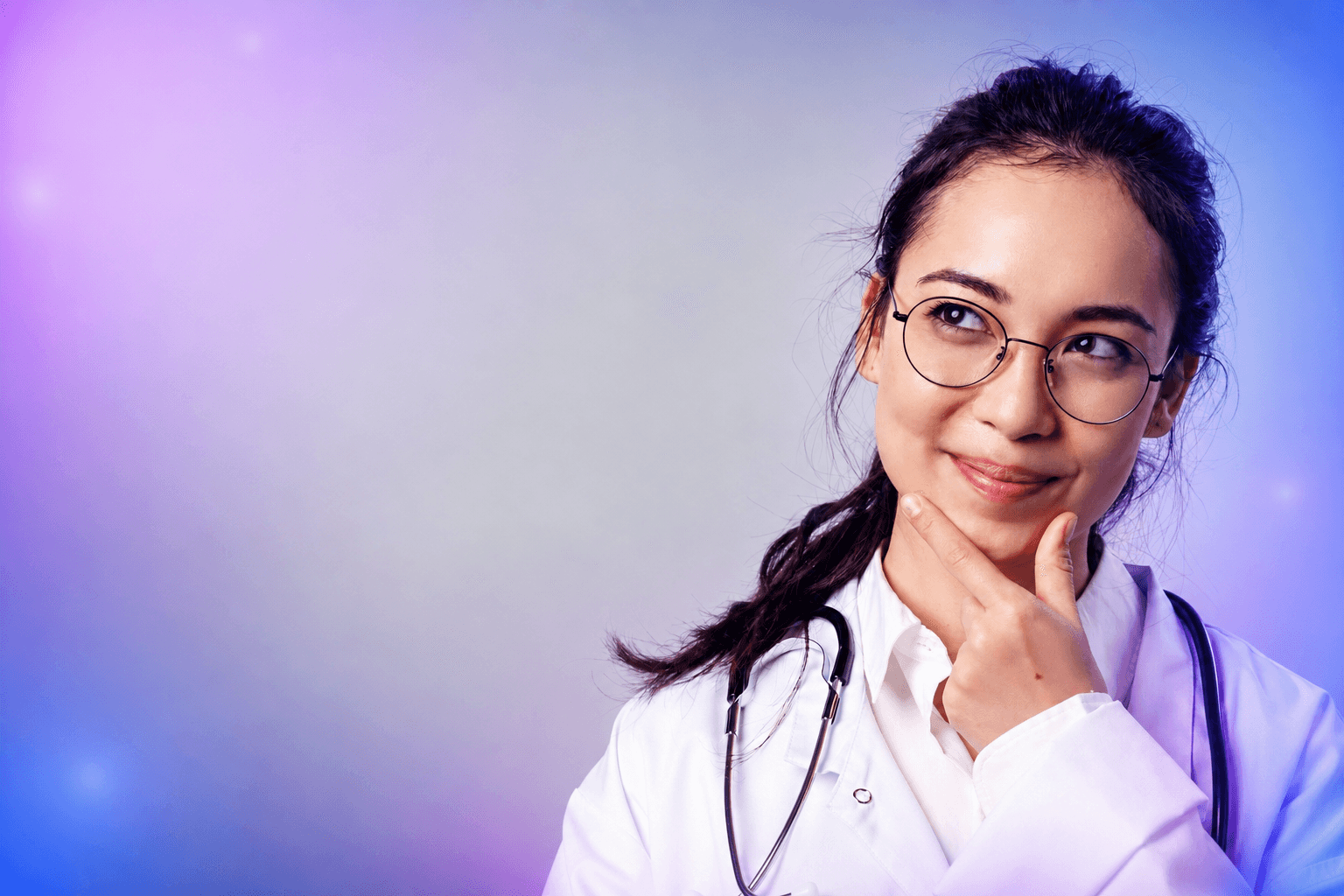 A care professional thinking, glasses slightly lowered — the moment before you decide what your practice could actually become.